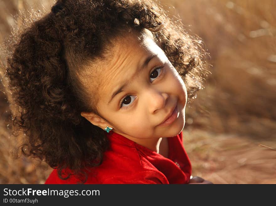 Young beautiful multiracial girl with afro hairstyle. Young beautiful multiracial girl with afro hairstyle