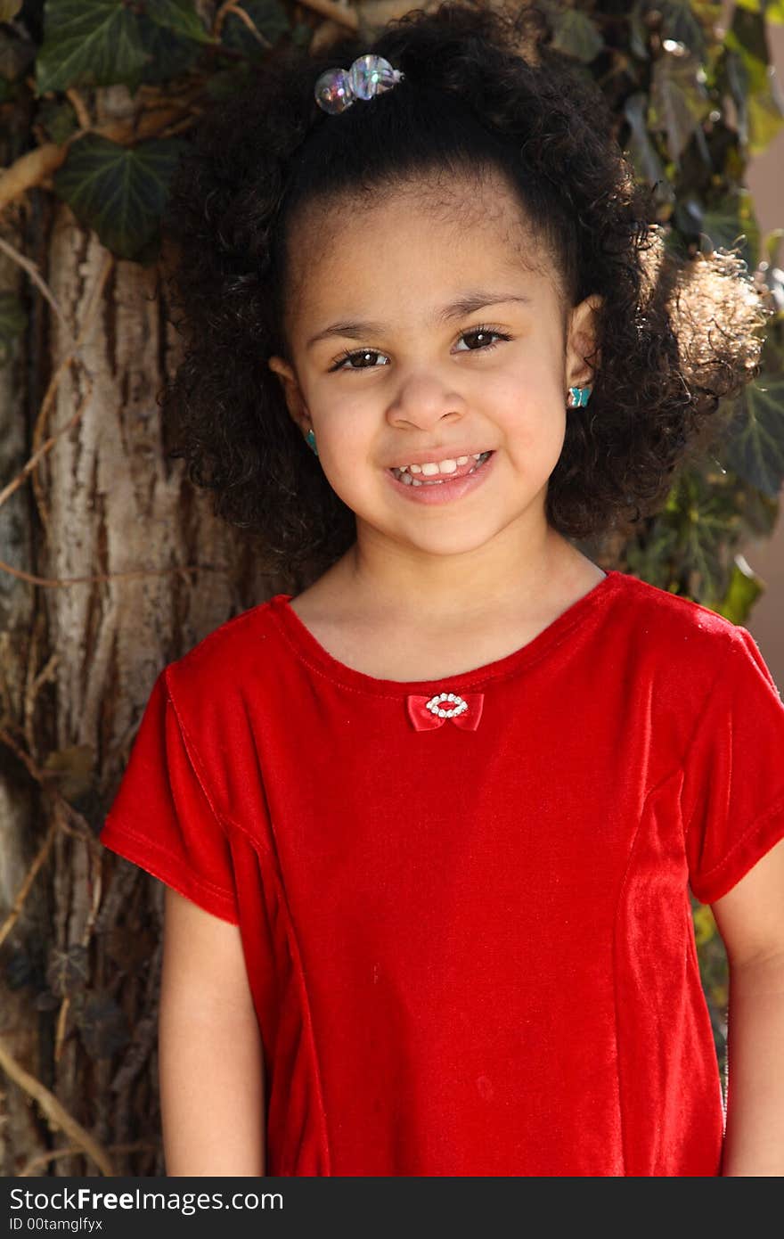 Young beautiful multiracial girl with afro hairstyle. Young beautiful multiracial girl with afro hairstyle