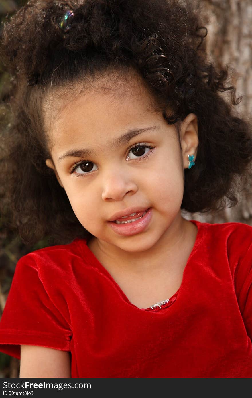 Young beautiful multiracial girl with afro hairstyle. Young beautiful multiracial girl with afro hairstyle