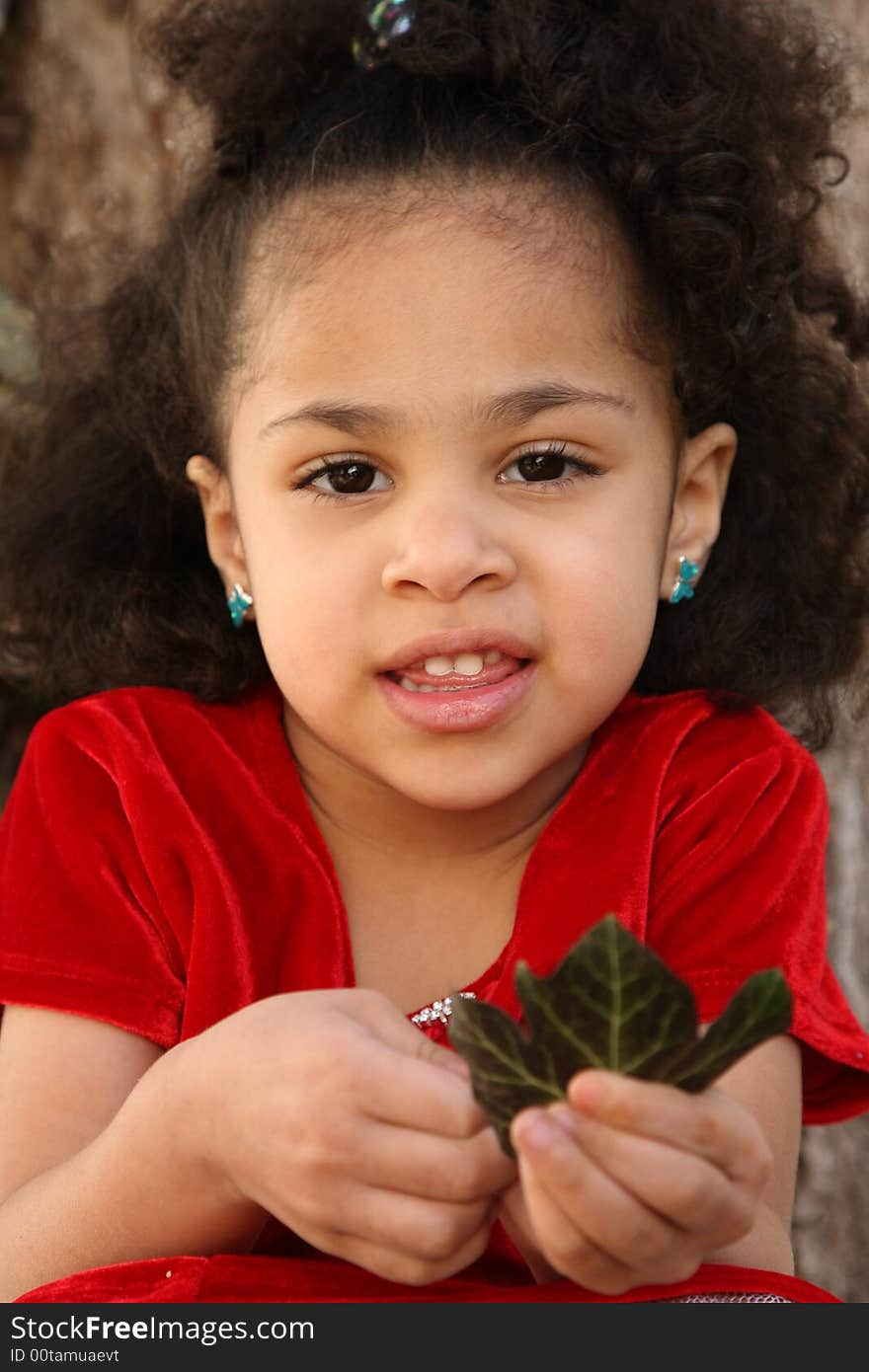 Young beautiful multiracial girl with afro hairstyle. Young beautiful multiracial girl with afro hairstyle