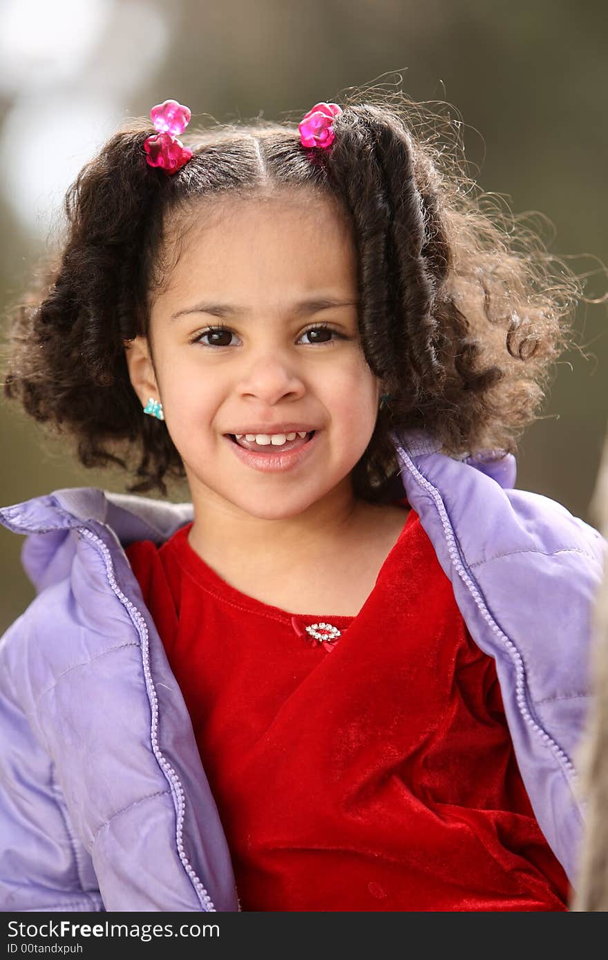 Young beautiful multiracial girl with afro hairstyle. Young beautiful multiracial girl with afro hairstyle