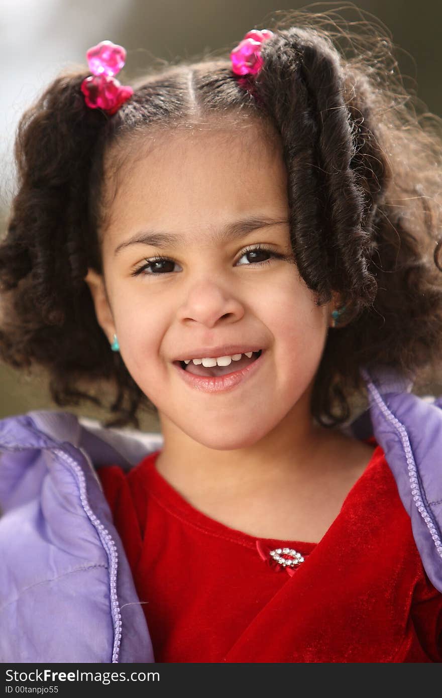 Young beautiful multiracial girl with afro hairstyle. Young beautiful multiracial girl with afro hairstyle