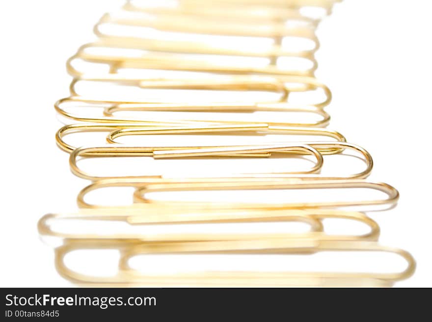 Paper clips on the white isolated background