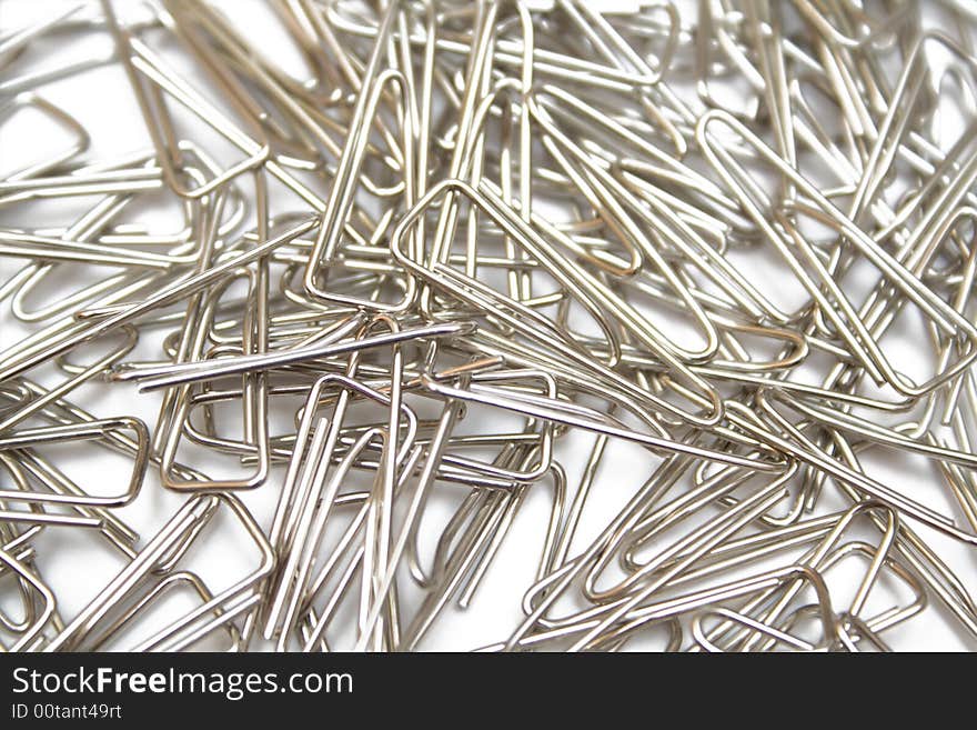 Paper clips on the white isolated background