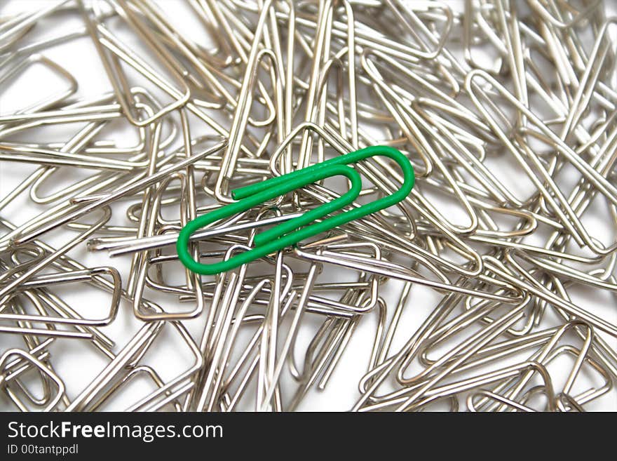 Paper clips on the white isolated background