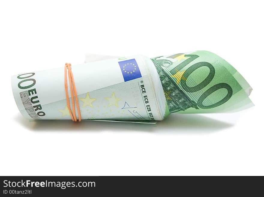 Some 100 euros banknotes over white isolated background