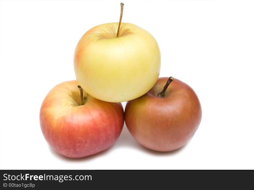 Three apples on the whie isolated background