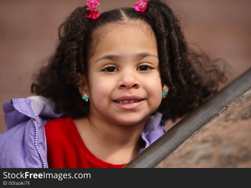 Young beautiful multiracial girl with afro hairstyle. Young beautiful multiracial girl with afro hairstyle