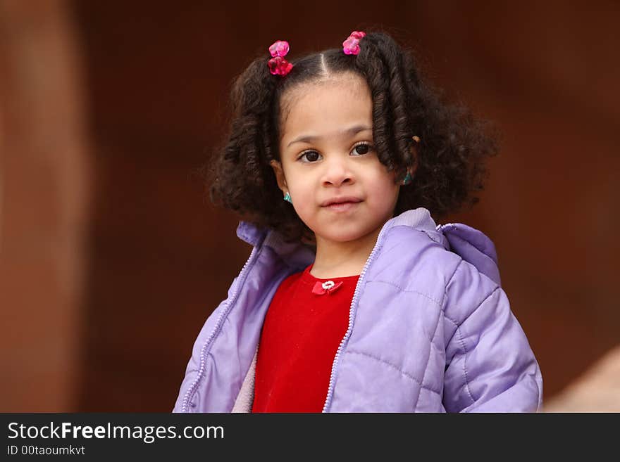 Young beautiful multiracial girl with afro hairstyle. Young beautiful multiracial girl with afro hairstyle