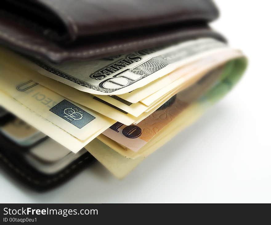 Banknotes in a wallet on a white background