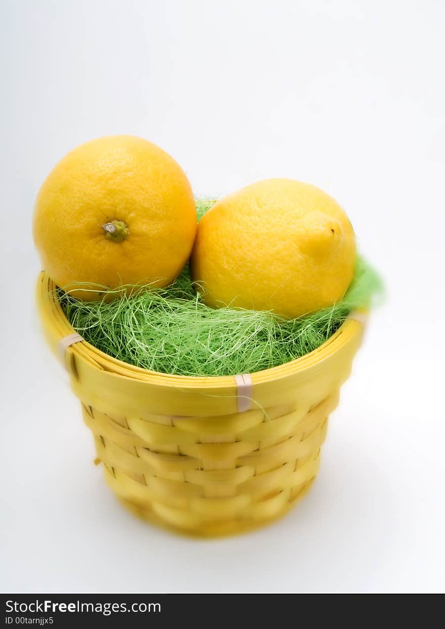 Two lemon fruits on a white background