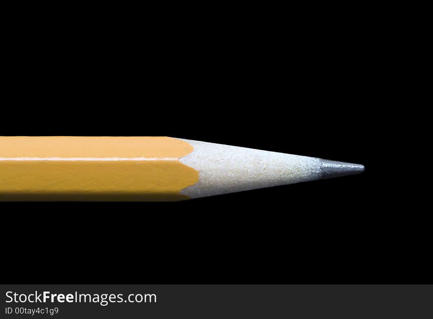 Closeup of a regular number 2 pencil shot against a black background. Includes clipping path.