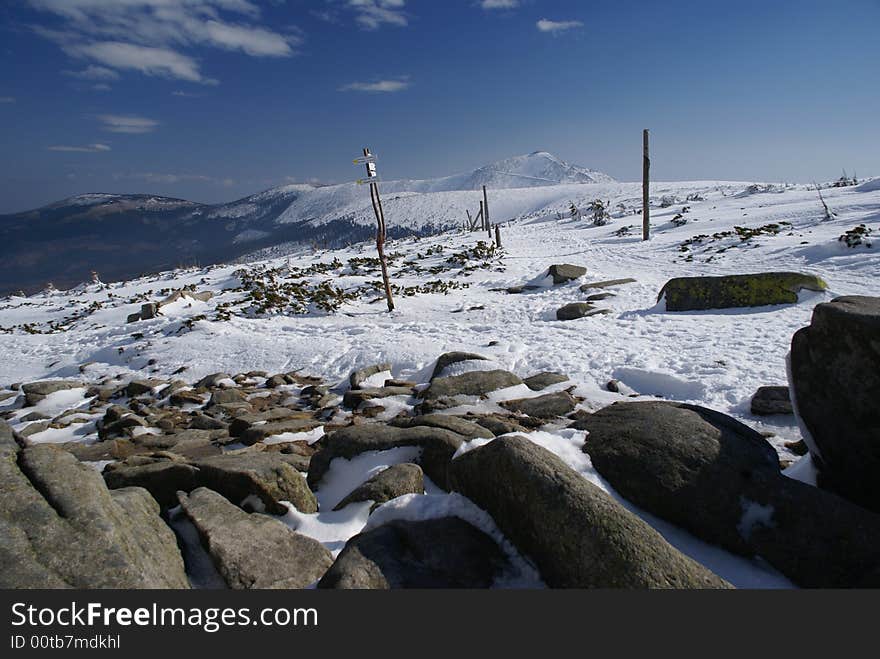 Winter landscape on sunny day with the highest Czech mountain - Snezka (Sniezka, Schneekoppe)