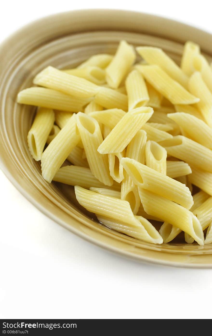 Cooked plain pasta with white isolated background close up. Cooked plain pasta with white isolated background close up.