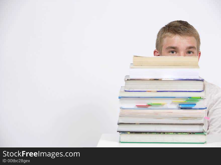 A teen age student over whelmed with home work