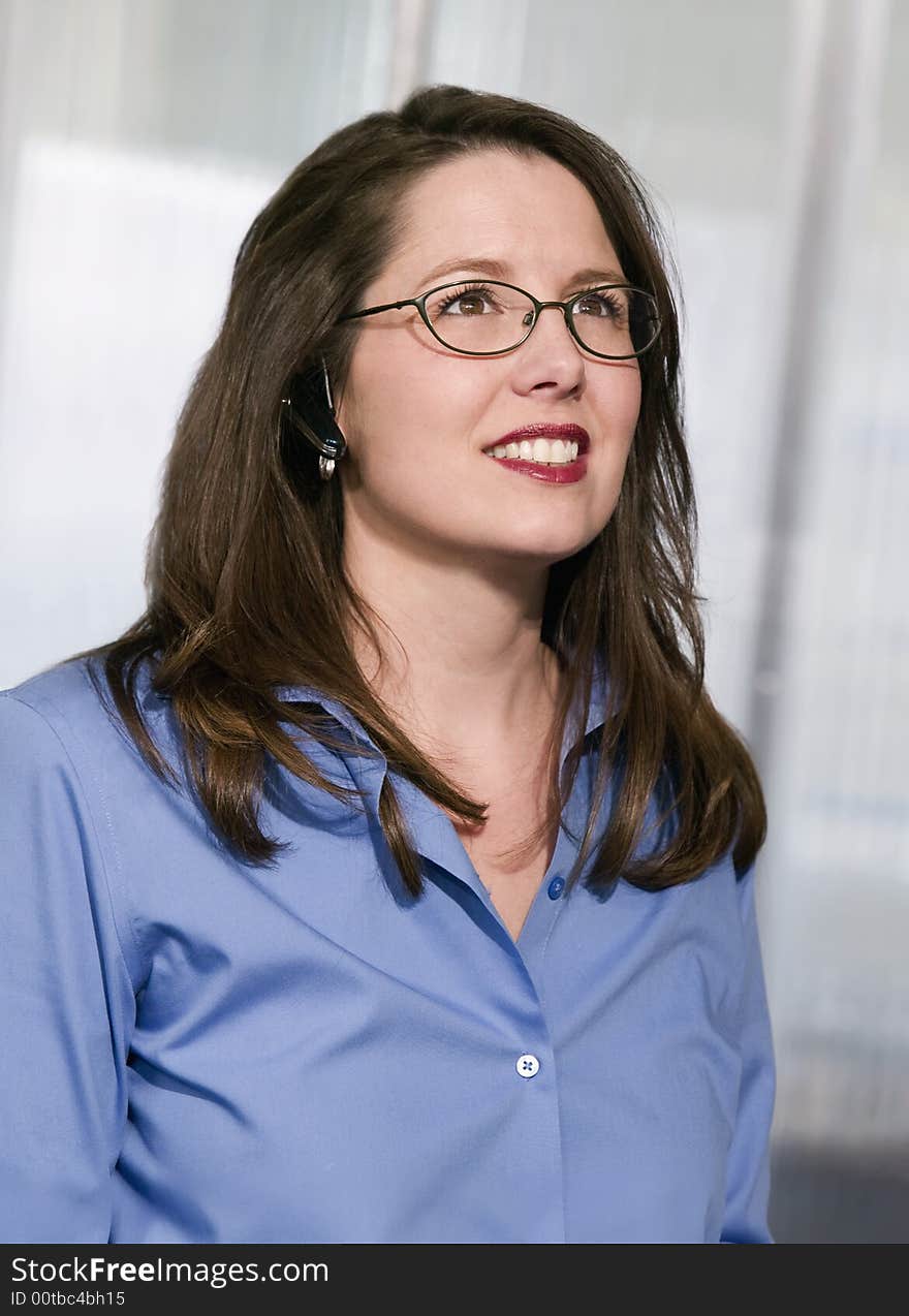 Businesswoman with a cell phone in her ear