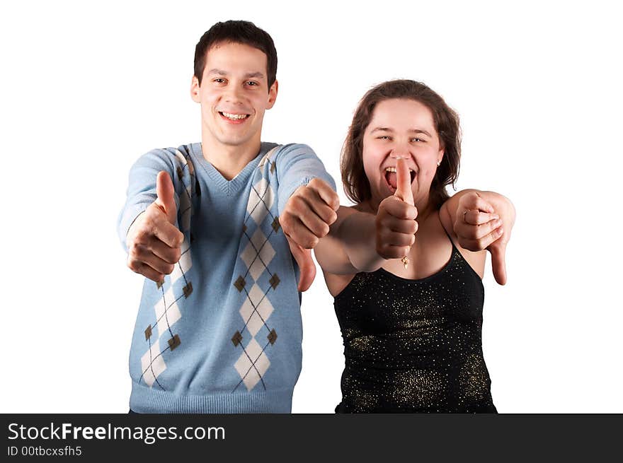 Young couple gives gesture isolated on white