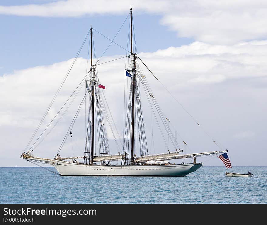 Double masted wooden sailing vessel. Double masted wooden sailing vessel