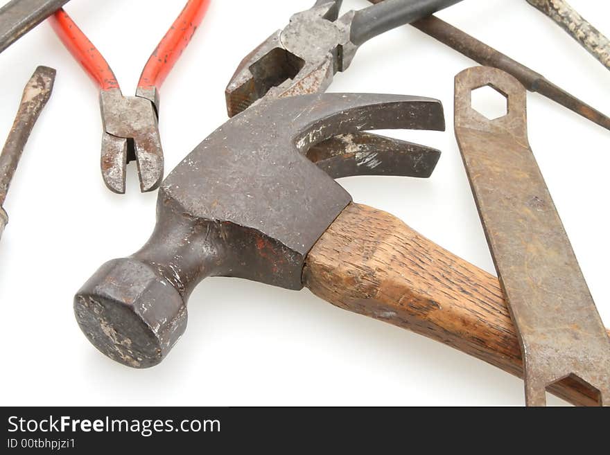 Old vintage hammer with tools laying around. Old vintage hammer with tools laying around