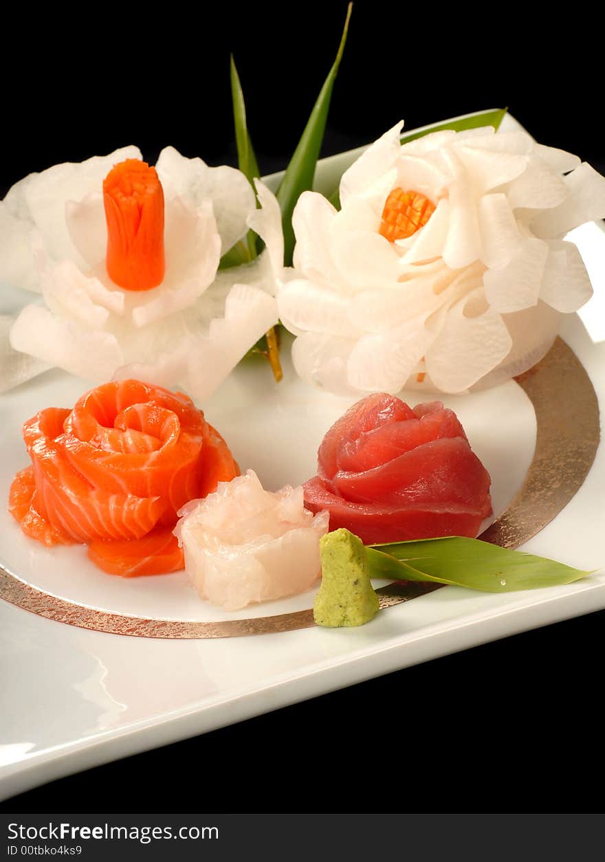 Platter Of Fresh Japanese Sashimi In Flower Shapes