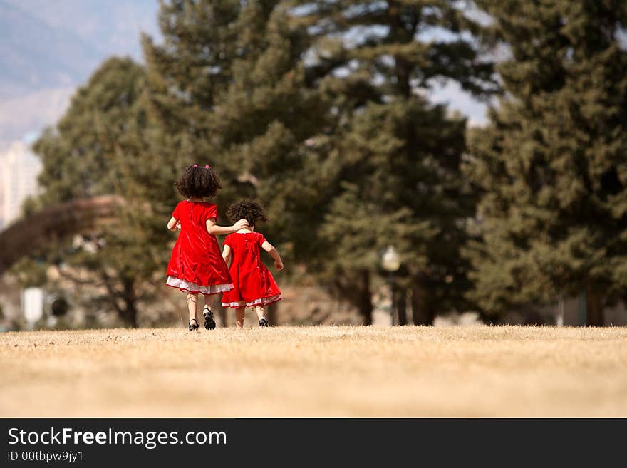 Beautiful multiracial children with afro hairstyle playing. Beautiful multiracial children with afro hairstyle playing