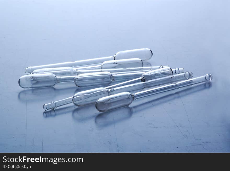 Chemistry tube In blue tones on laboratory table