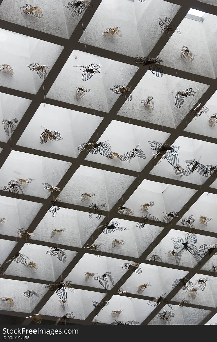 Butterfly decorations hanging from a roof