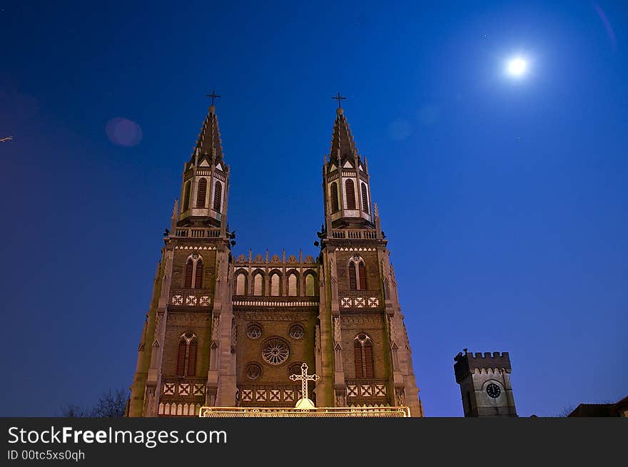 The Church in the night. The full moon is in the sky. The Church in the night. The full moon is in the sky.