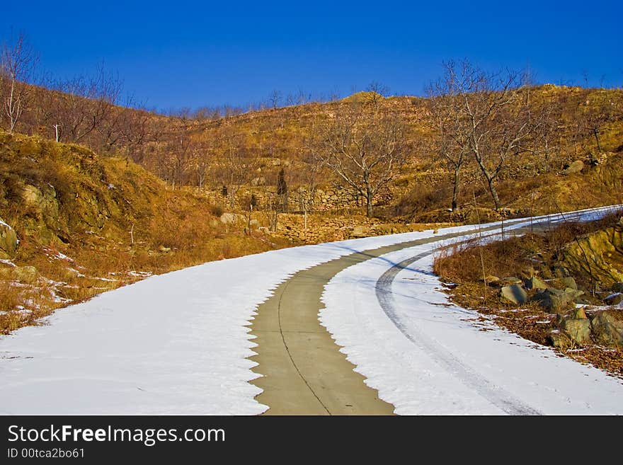 In the southern of Jinan, Shandong, China PR, Snow falling in the mountain area. In the southern of Jinan, Shandong, China PR, Snow falling in the mountain area.