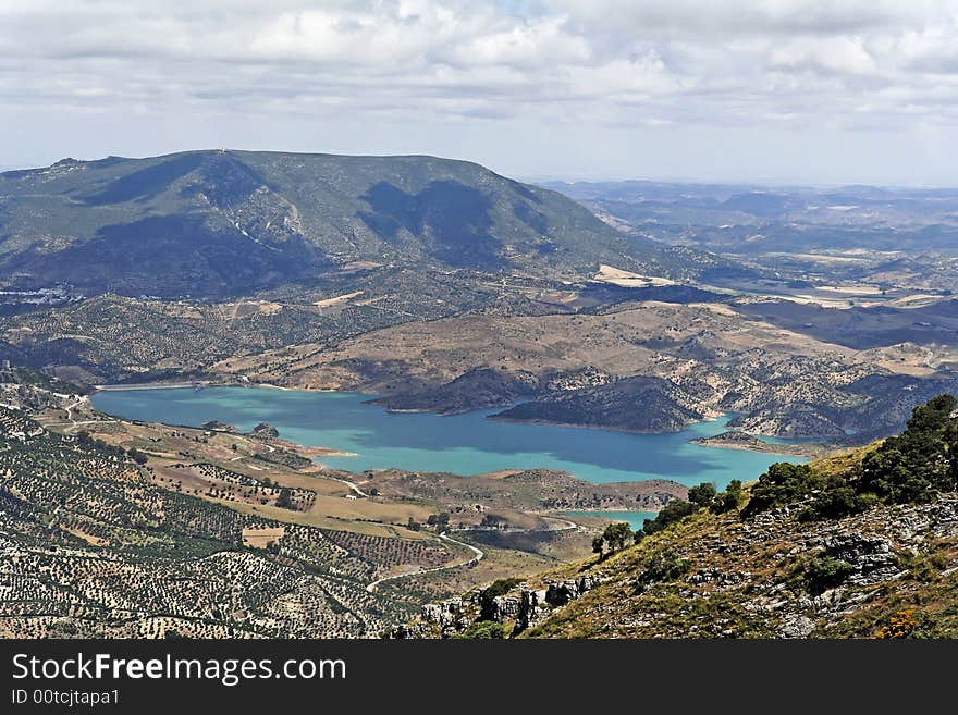 Hill and lake in Andalusia, Spain, route white villages