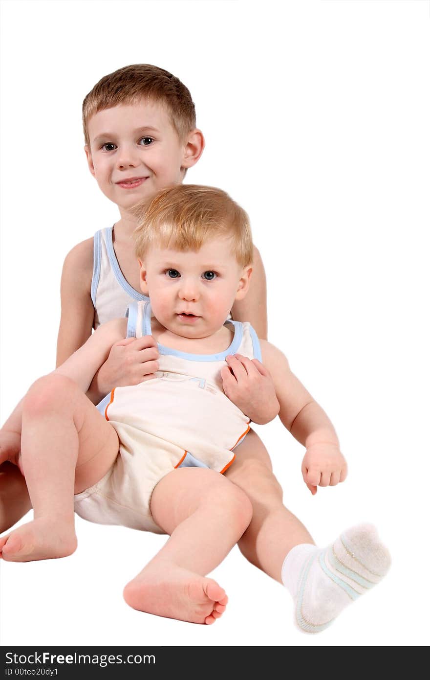 Two small boys together look directly in the chamber. Two small boys together look directly in the chamber