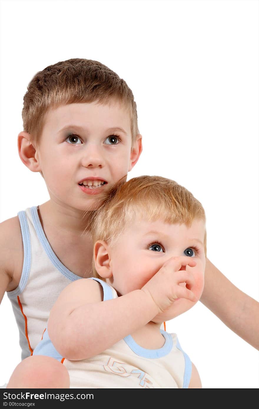 Two small boys together look directly in the chamber. Two small boys together look directly in the chamber