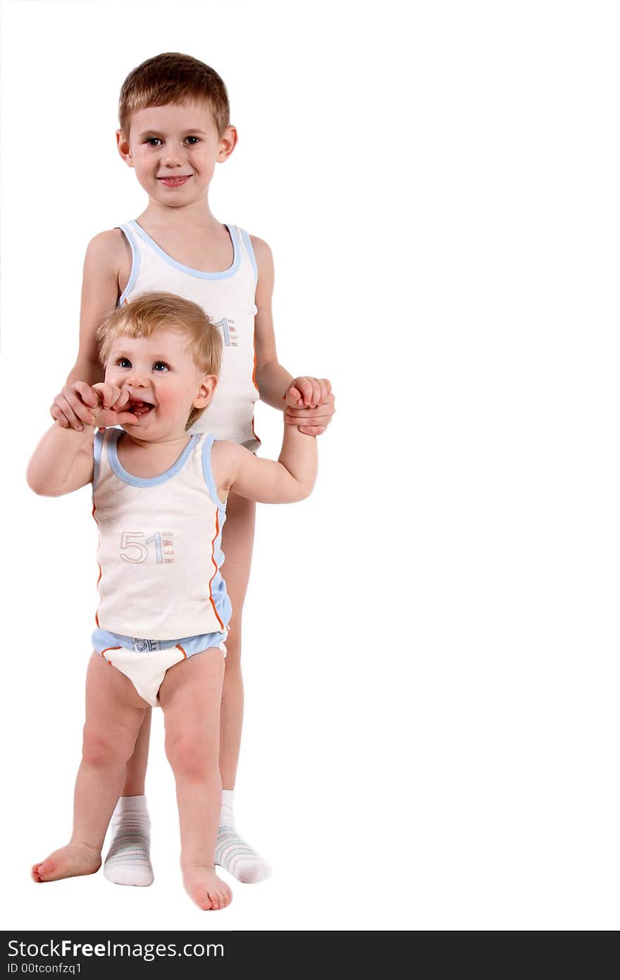 Two small boys together look directly in the chamber. Two small boys together look directly in the chamber