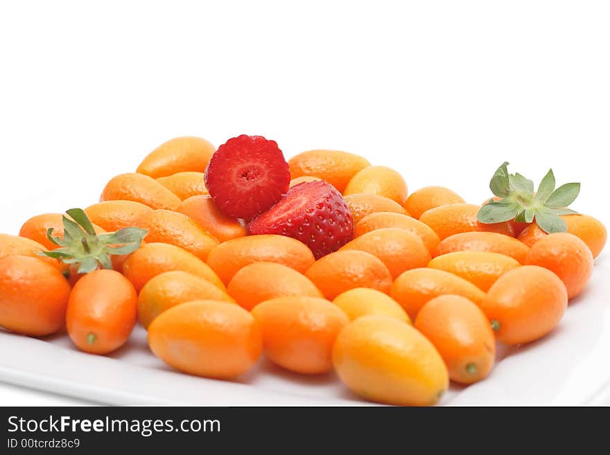 Strawberry and kumquats