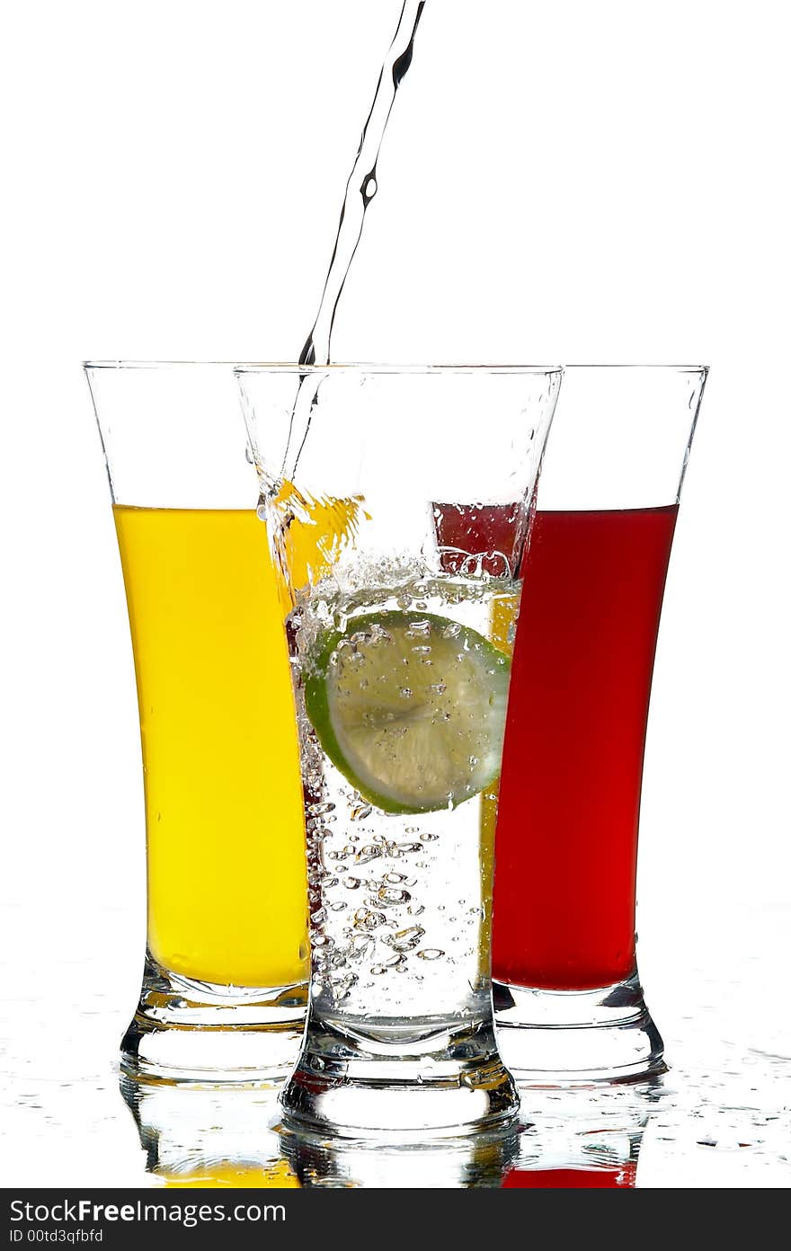 Glasses with juice and lemon