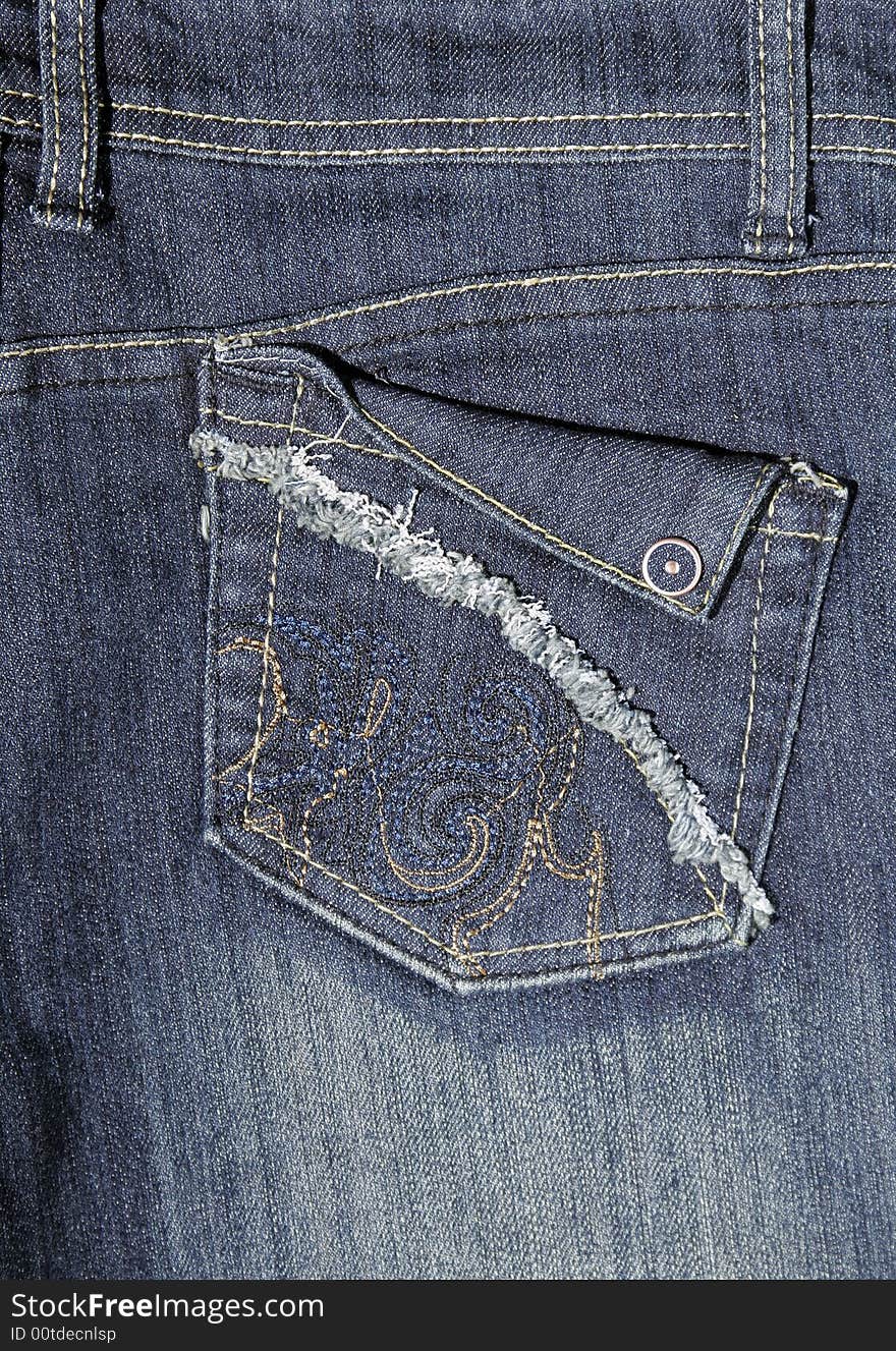 Close-Up Of Blue Jeans Pocket - Denim Background