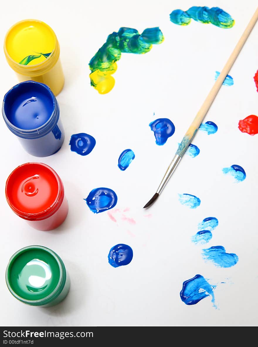 Brush And Many Paint Jars