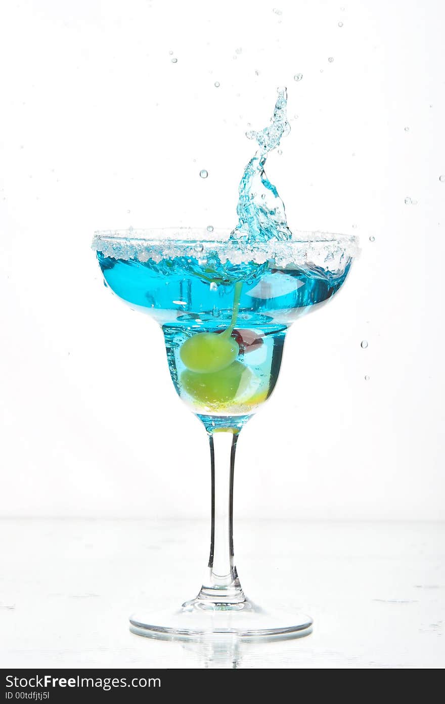 Still life with glass with drink on the white background