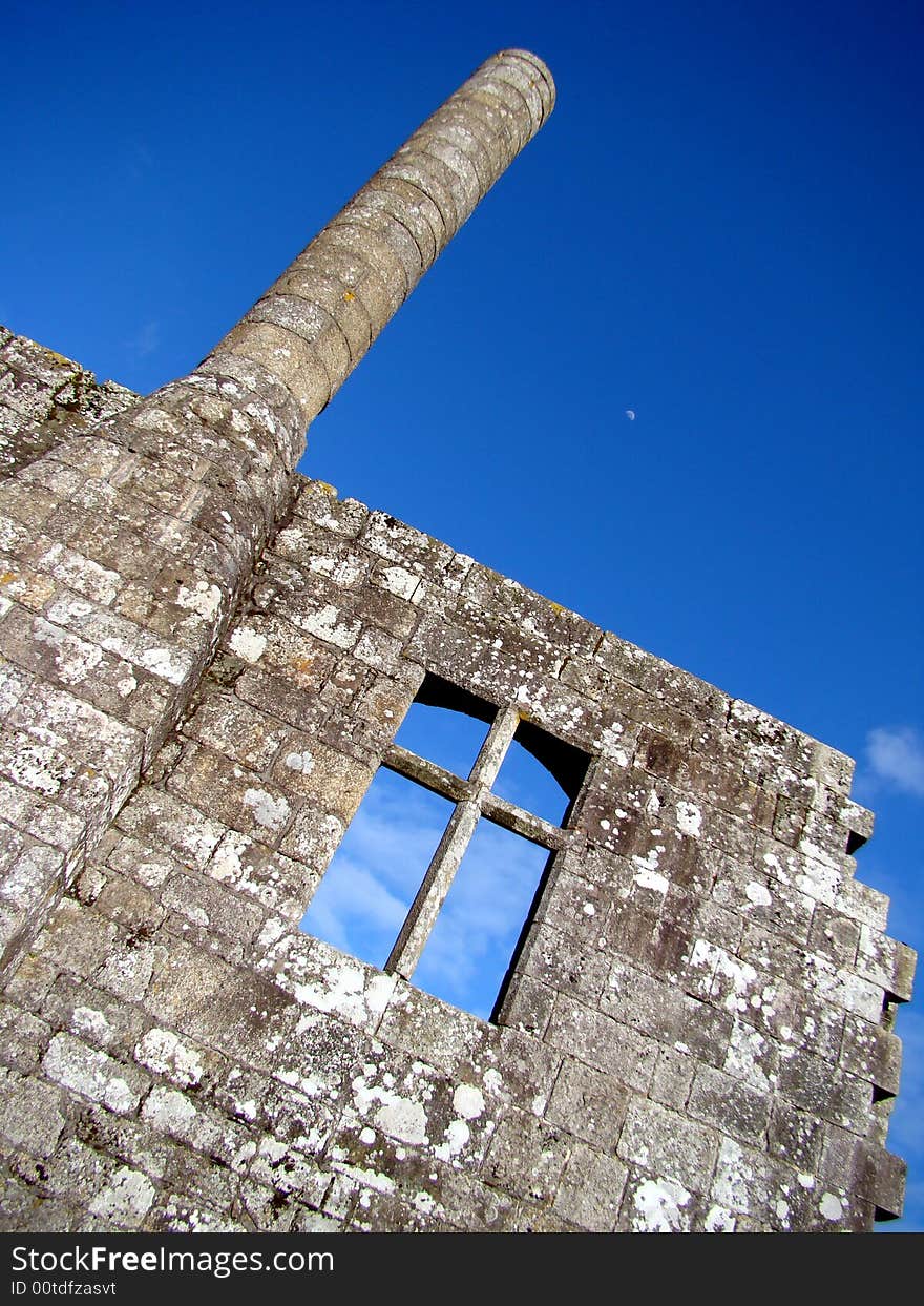 Barcelos city castle front wall and window in the afternoon under a blue sky. Barcelos city castle front wall and window in the afternoon under a blue sky