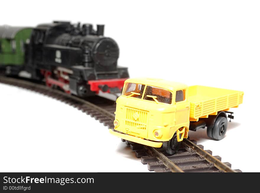 Black train and yellow car. Black train and yellow car