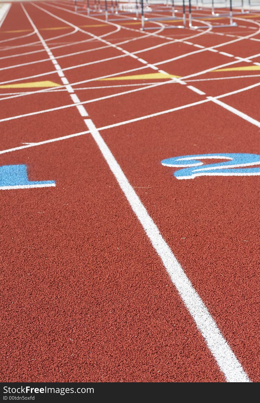 A picture of a track and field venue. A picture of a track and field venue