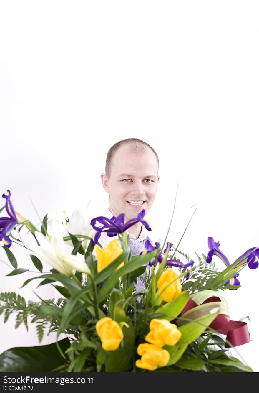 Handsome man with bunch of flower. Handsome man with bunch of flower.