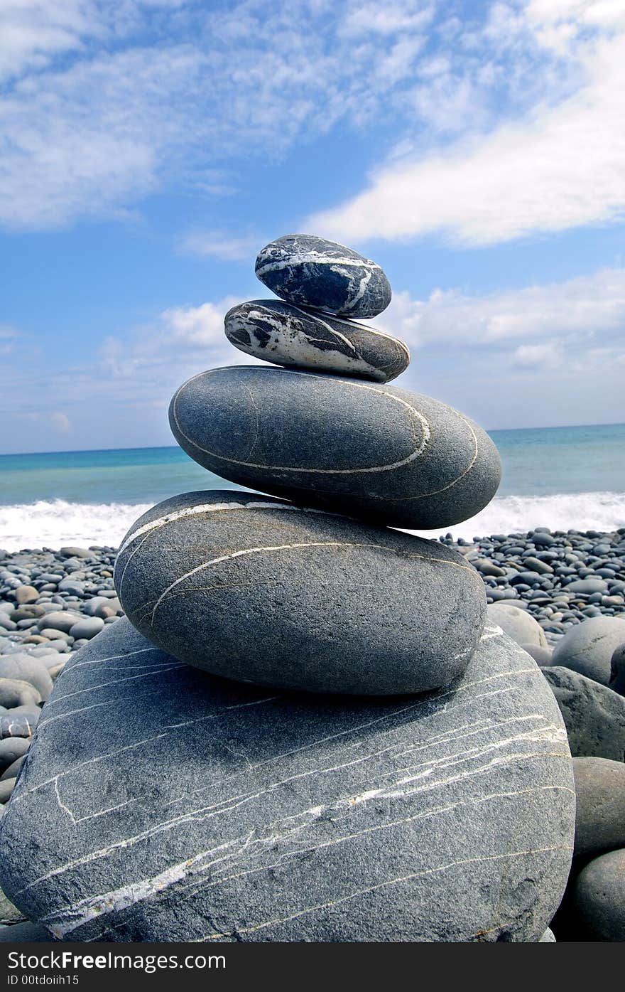 Zen stack of pebbles on the beach. Zen stack of pebbles on the beach