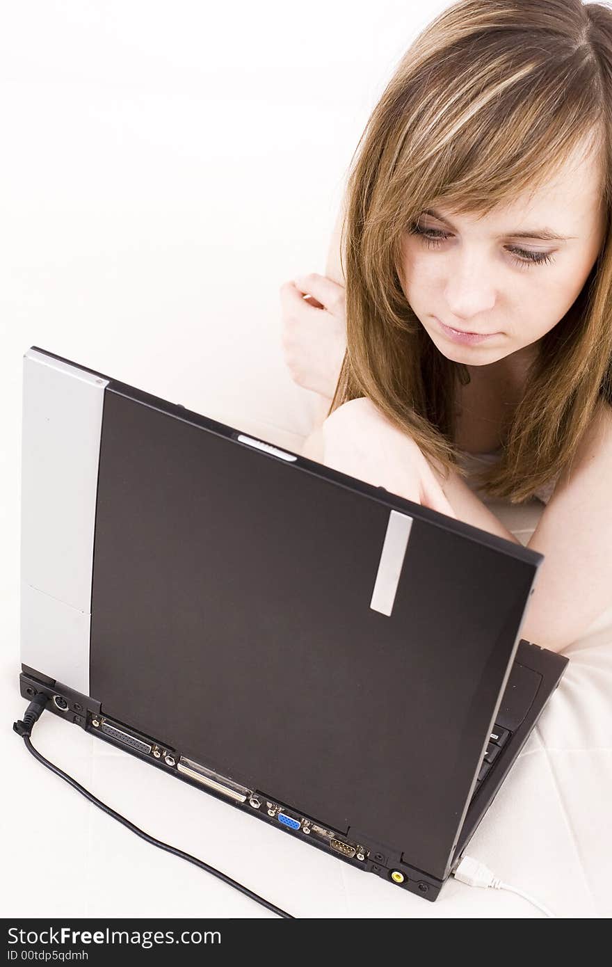 Young Girl Using A Laptop.