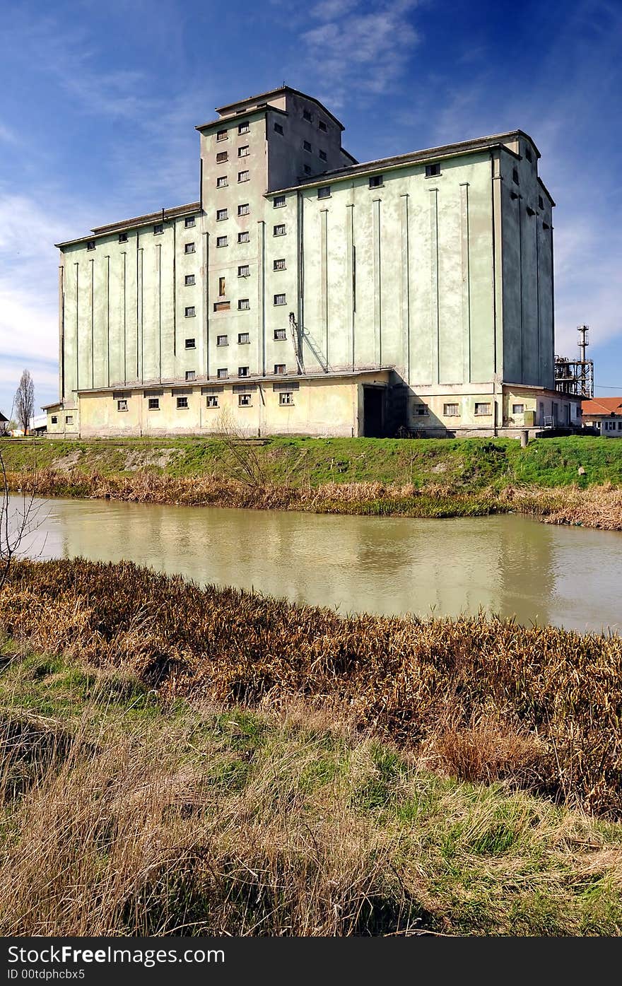 A view with a concrete silo. A view with a concrete silo