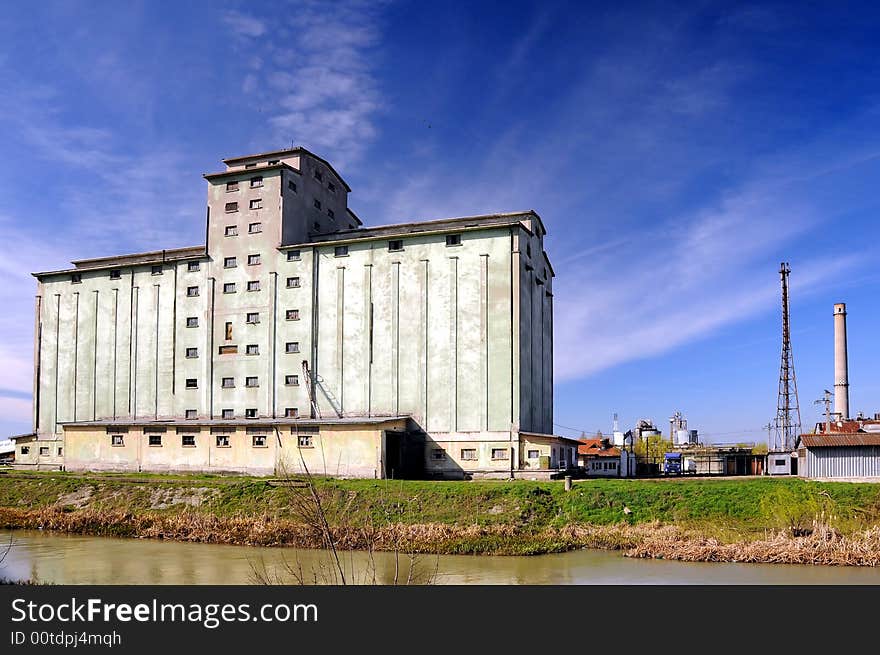 A view with a concrete silo. A view with a concrete silo