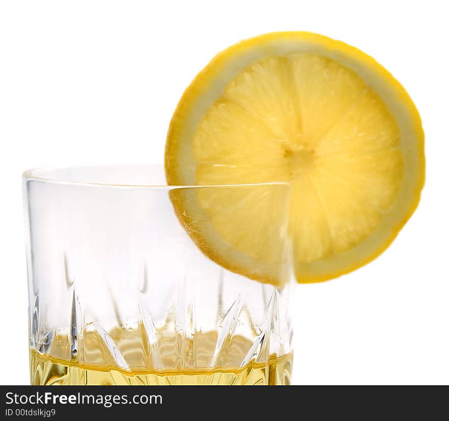 Lemon slice on the glass with lemonade