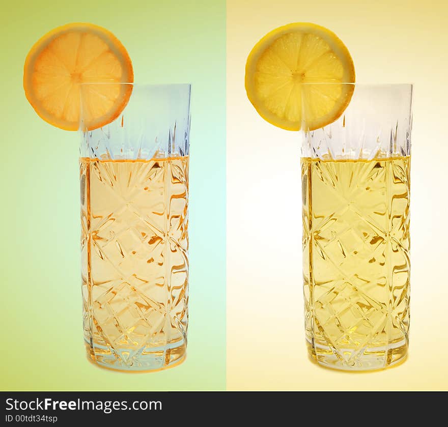 Lemon slice on the glass with lemonade. Lemon slice on the glass with lemonade