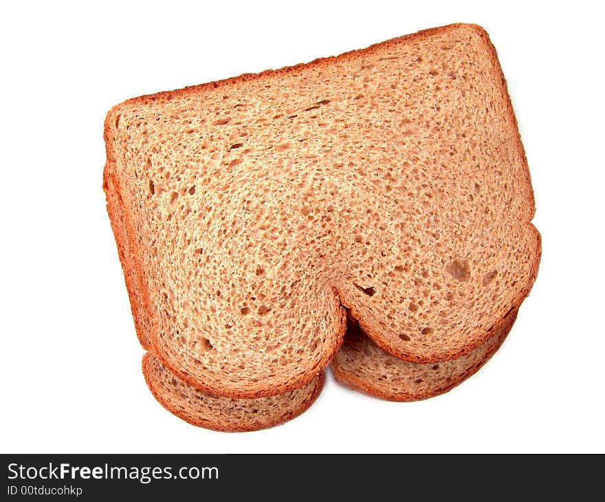 Close-up of two pieces of stacked whole grains or wheat breads (isolated on pure white background). Close-up of two pieces of stacked whole grains or wheat breads (isolated on pure white background)