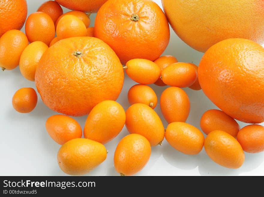 Citrus fruits on a glass table